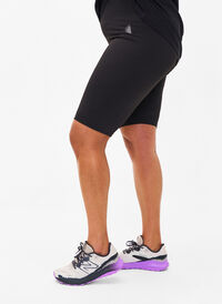 Lange tætsiddende træningsshorts, Black, Model