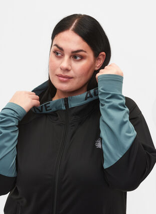 Træningscardigan med hætte, Black, Model image number 2
